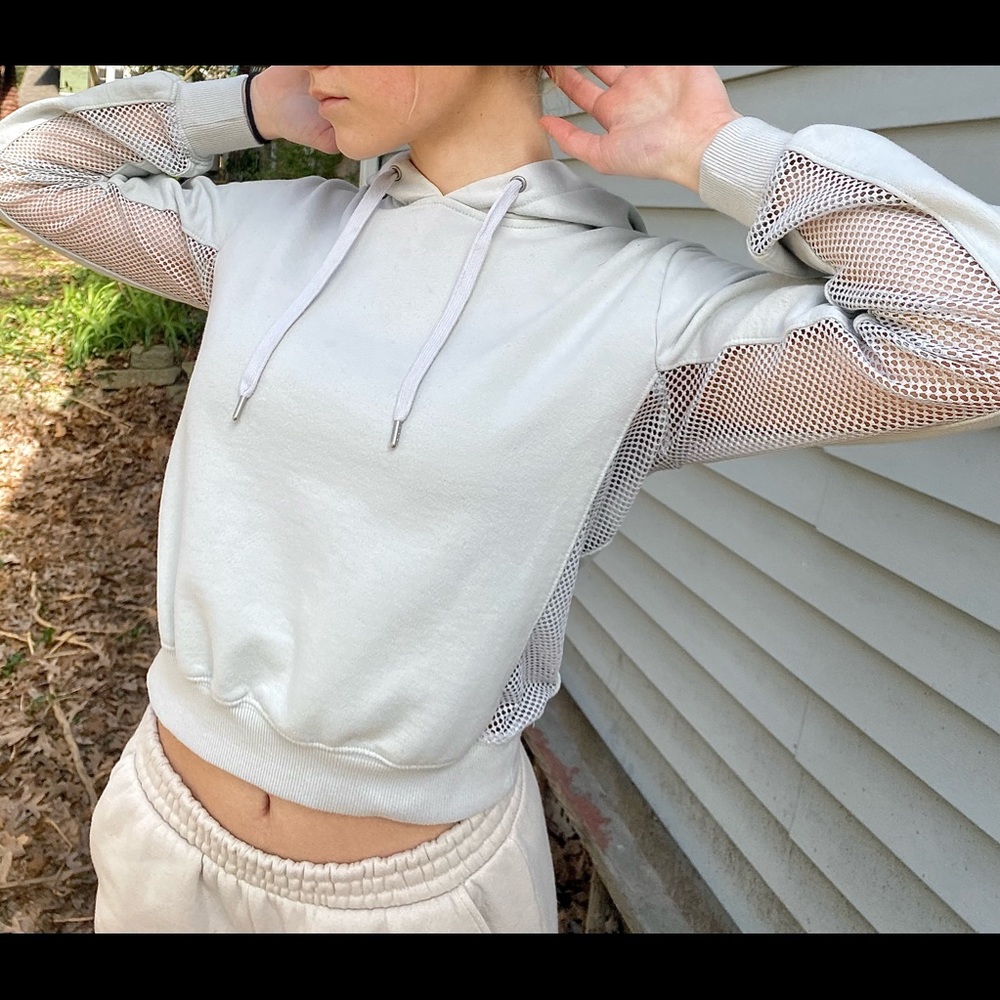 Pastel mint sweatshirt with mesh on both sides from Garage in a size small